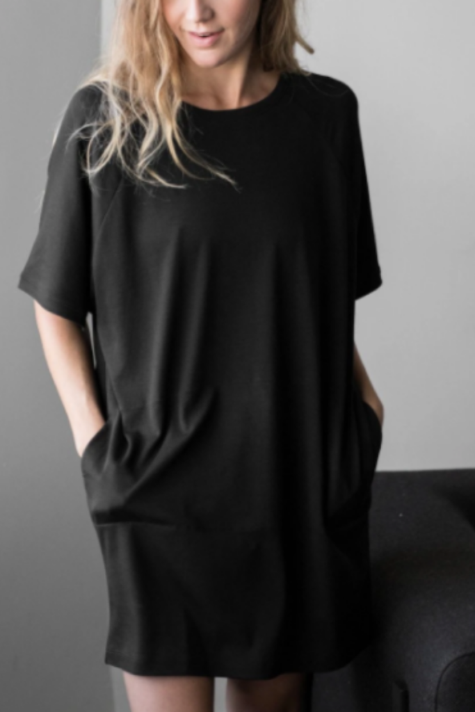 Cropped image of a woman wearing a black lounge set