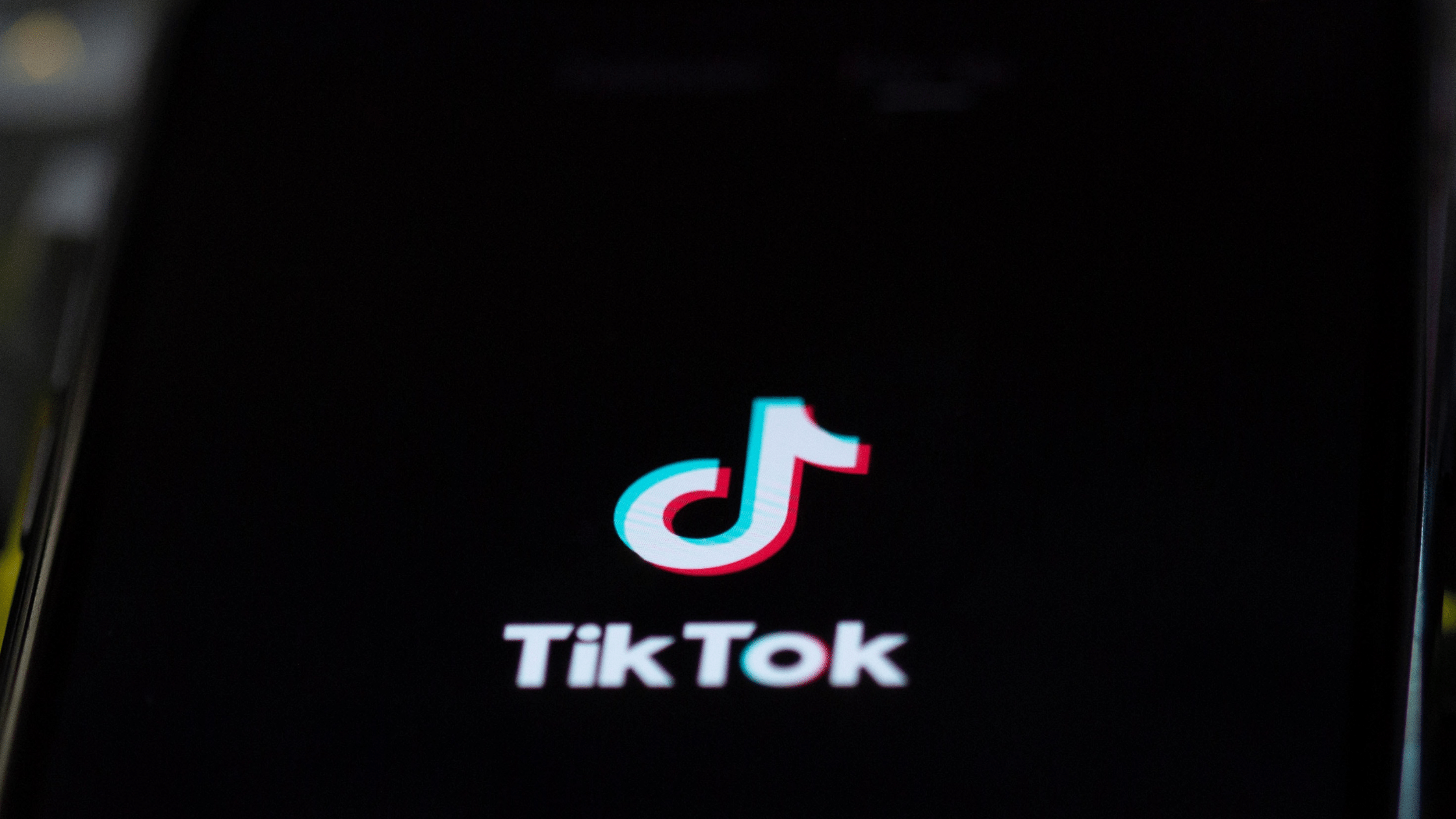 Tik Tok Logo On Black Phone Background